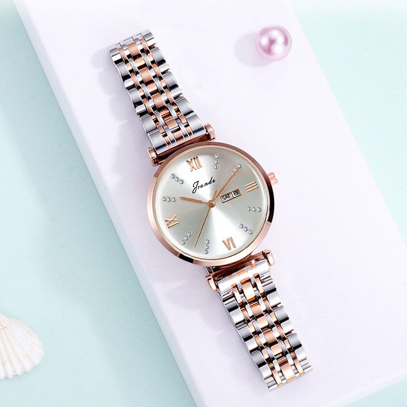 Women's gold and silver stainless steel quartz watch with round silver dial and Roman numerals.