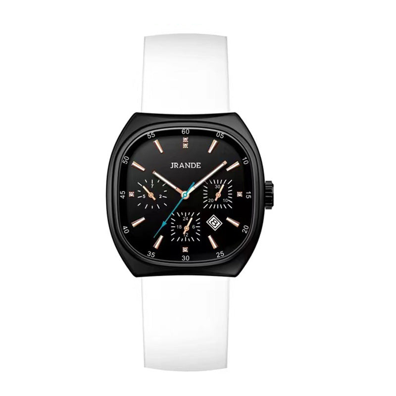 Black square quartz watch with rose gold markers, white silicone strap, and three subdials.