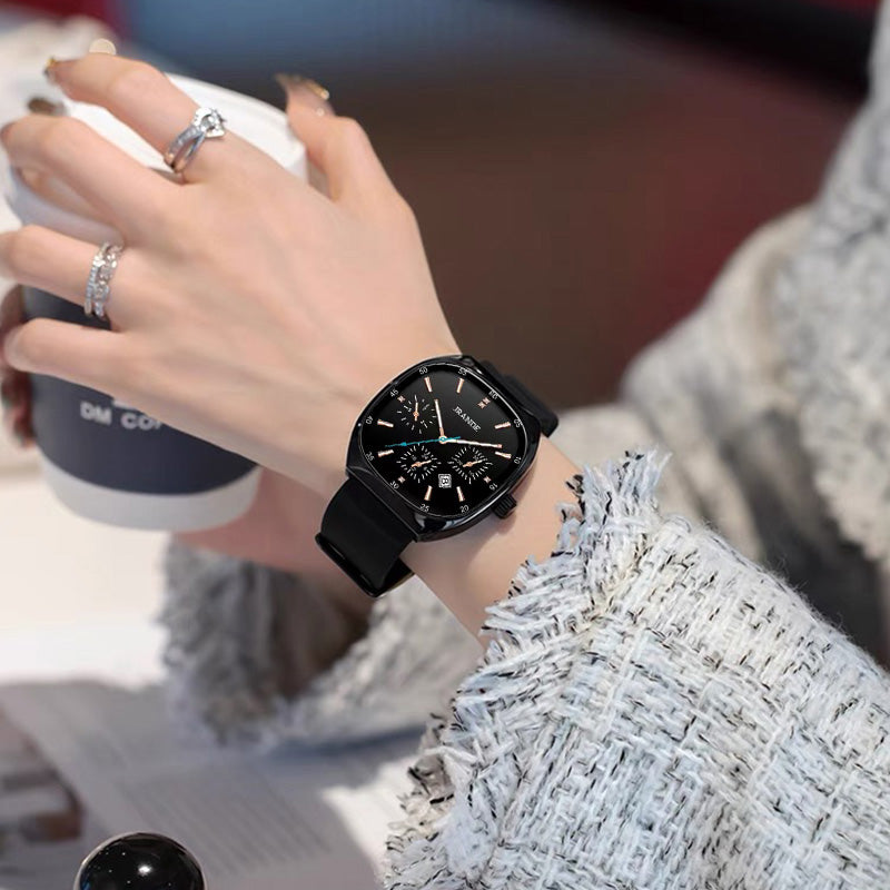 Black JRANDE H9350L unisex quartz watch with silicone strap and minimalist dial on wrist.