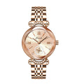 Women's gold-tone stainless steel quartz watch with round dial and crystal accents.